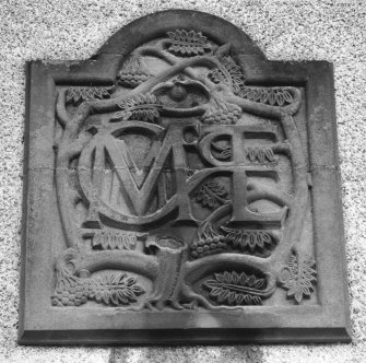 Detail of carved panel with initials of Professor Thomas and Lady Elliot nee McCosh and his wife