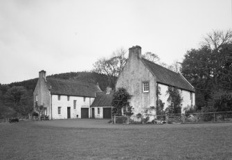 View of  garage and cottage block from SW