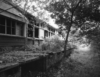 View from NE showing station building and platform.