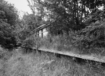 View from WNW showing station building and platform.