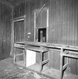 Interior.
Station building, view of ticket staff office from NE showing counter and hatch.