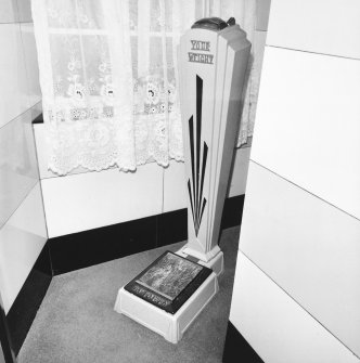 Interior.
Ladies' toilet, detail of 'Autoway' weighing machine.