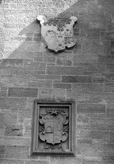 Detail of coats of arms on N elevation.