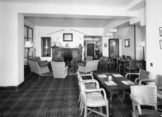 Interior.
Lounge, view from E looking towards the c. 1970 fireplace.