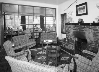 Interior.
Lounge, view from NNE looking through glazed screen to dining room.