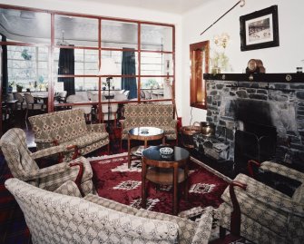 Interior.
Lounge, view from NNE looking through glazed screen to dining room.