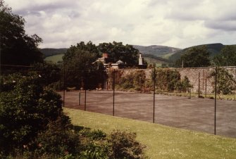 View of tennis court and garden house from SW.