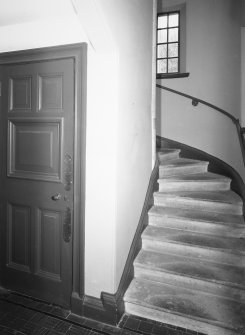 Interior. View of E stair, leading up to billiard / music room