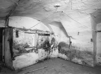 Interior.
Ground floor, central vaulted room, view from SW.