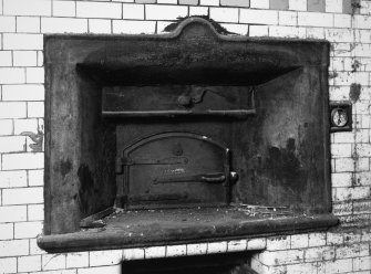 Interior.
Detail of oven.