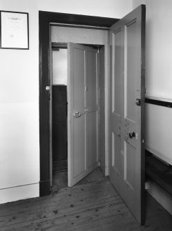 Interior - first floor, council chamber, south east corner, detail of doors to strong room