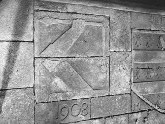 Detail of sculptured stones in entrance porch.