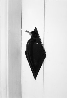 Interior.
Detail of door latch.