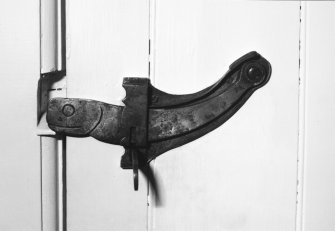 Interior.
Detail of door latch.