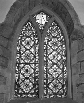 Interior. Detail of 2-light pointed arch stained glass window