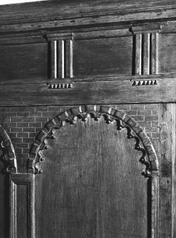 Interior.
Ground floor, hall, detail of seventeenth century timber panelling showing carved arcading with entablature.