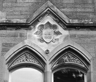 Detail of stonework with plaque "J.B. 1868"