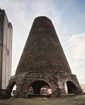 View of North Cone from NE, with part of modern glass factory visible (left)