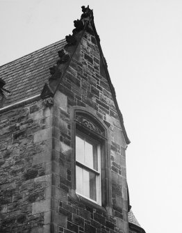 View of rectangular turret and gable cope on SW elevation.