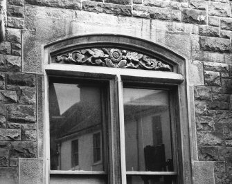 Detail of decorated window lintel on SW elevation.