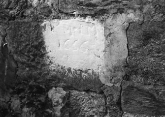 Detail of inscription on S wall.