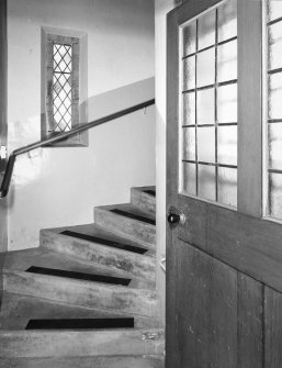 Interior. View of gallery staircase