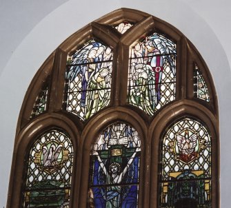 Interior. Chancel stained glass window of the cruxifiction by Douglas Strachan 1924