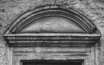 Detail of pediment over doorway.