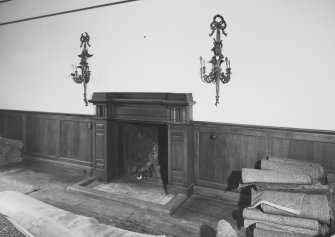 Interior.
View of fireplace and panelling in E apartment of principal floor.