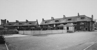 View of 51 - 63 and 65 - 73 Philpingstone Road from NW.