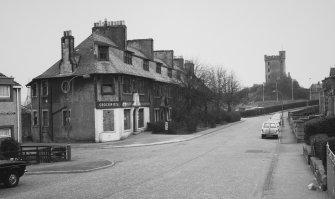 View of 51 - 63 Philpingstone Road from SW including Bridgeness Tower.