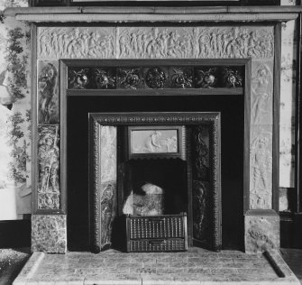 Interior.
Detail of tiled fireplace.