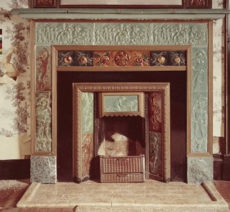 Interior.
Detail of tiled fireplace.