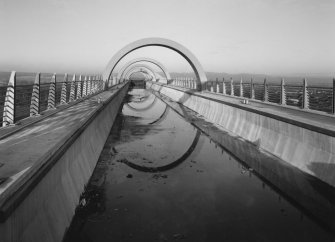 View from S along Union Canal aqueduct, the last portion of which (in distance) is the rotating boat lift