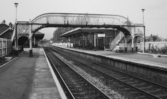 General view of platforms showing footbridge from E.