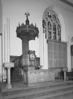 Interior. View of chancel from SW showing pulpit, font, communion table and lecturn