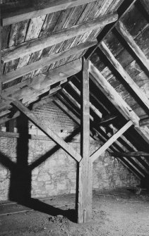 Interior.
View of roof structure showing king post.