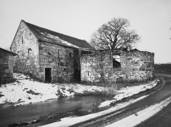 View of horse-engine house and threshing barn from SE