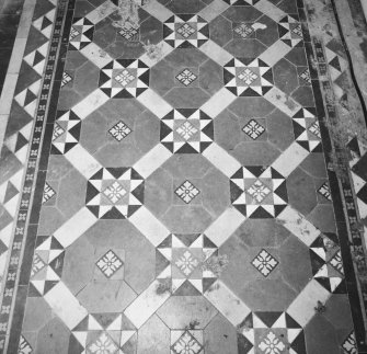 Interior.
Ground floor, W access corridor, detail of floor tiles.