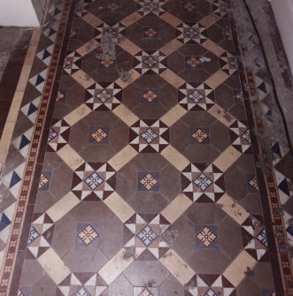 Interior.
Ground floor, W access corridor, detail of floor tiles.
