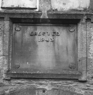 Detail of 1843 date plaque above entrance.