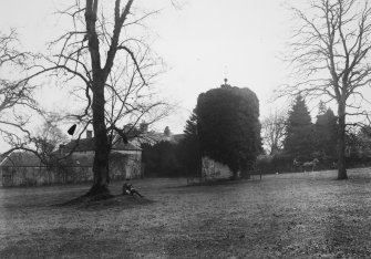 View of grounds with house in background.