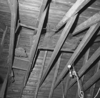 Interior.
E outbuilding, detail of roof structure.