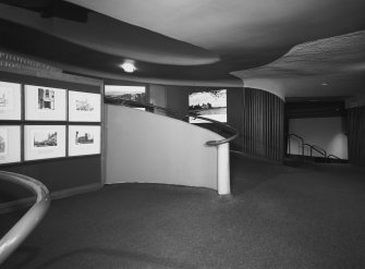 Interior.
View of lower level of exhibition ramp with theatre entrance.