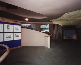 Interior.
View of lower level of exhibition ramp with theatre entrance.