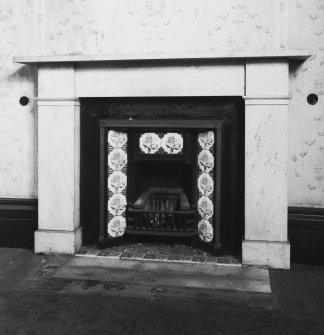 Interior.
Detail of fireplace in NE room on ground floor.