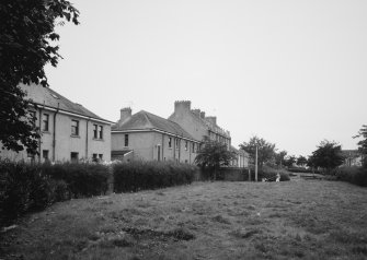 View of rear of Drip Rd from East