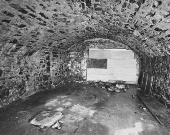 Interior.
View from SE of vaulted chamber on ground floor.