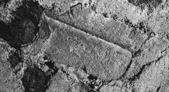 Interior.
Detail of moulded fragment built into ceiling of vaulted chamber on ground floor.