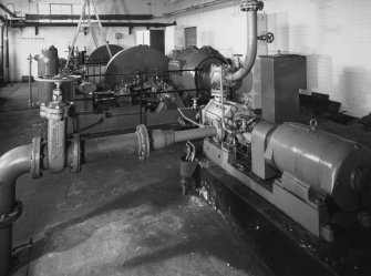 Hydraulic Pump House [N1]: view of hydraulic pumping machinery, including 1 of 2 G and J weir of Glasgow units in foreground, and 2 larger unidentified units in background, each powered by British Thomson Houston electric motors.